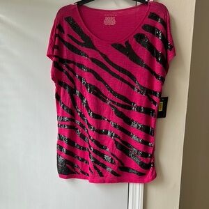 pink/black top.  Investments 60% cotton, 40% modal. Black is sequins.